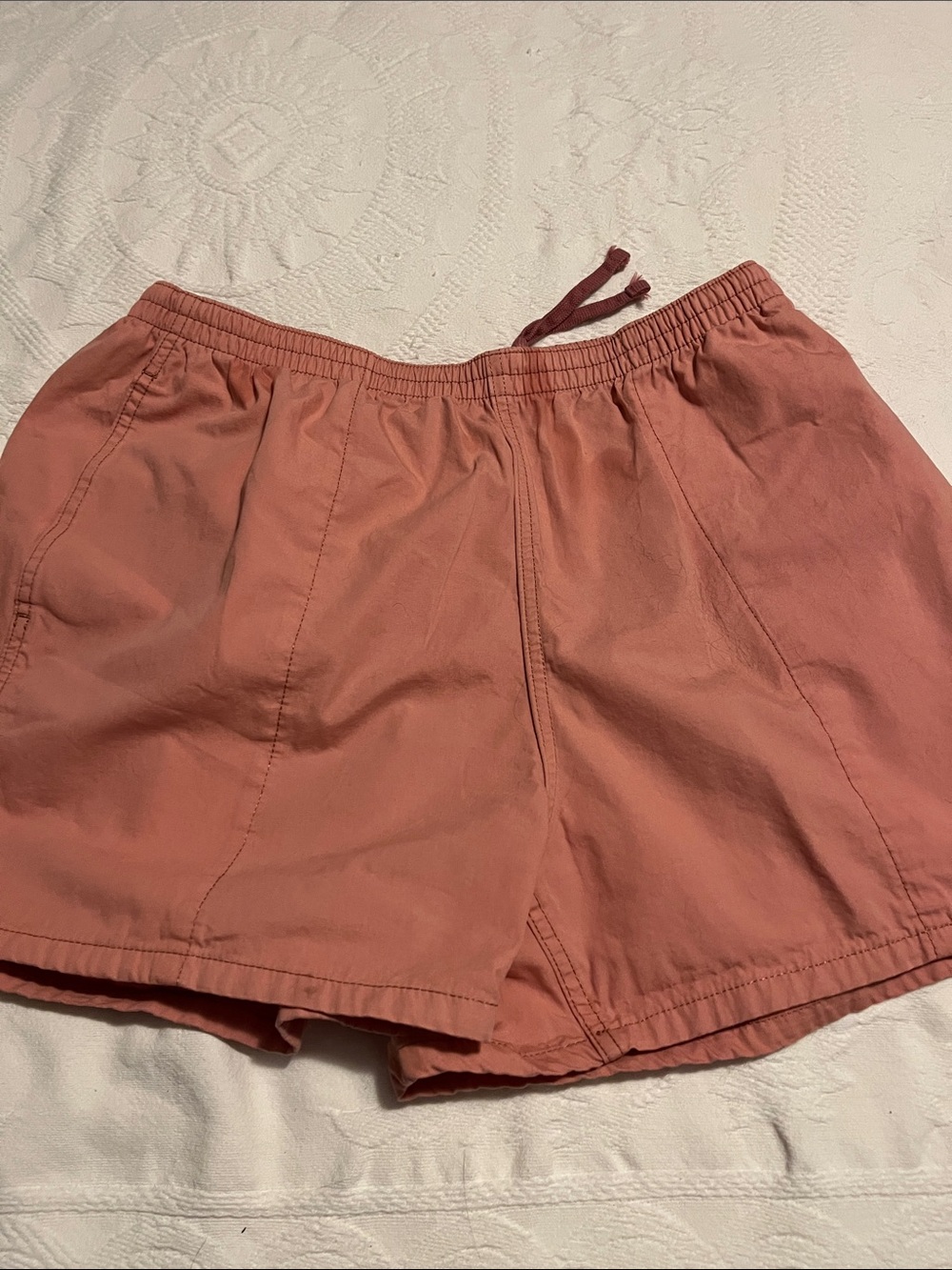 Patagonia coral colored shorts with side pockets and one in the back size large